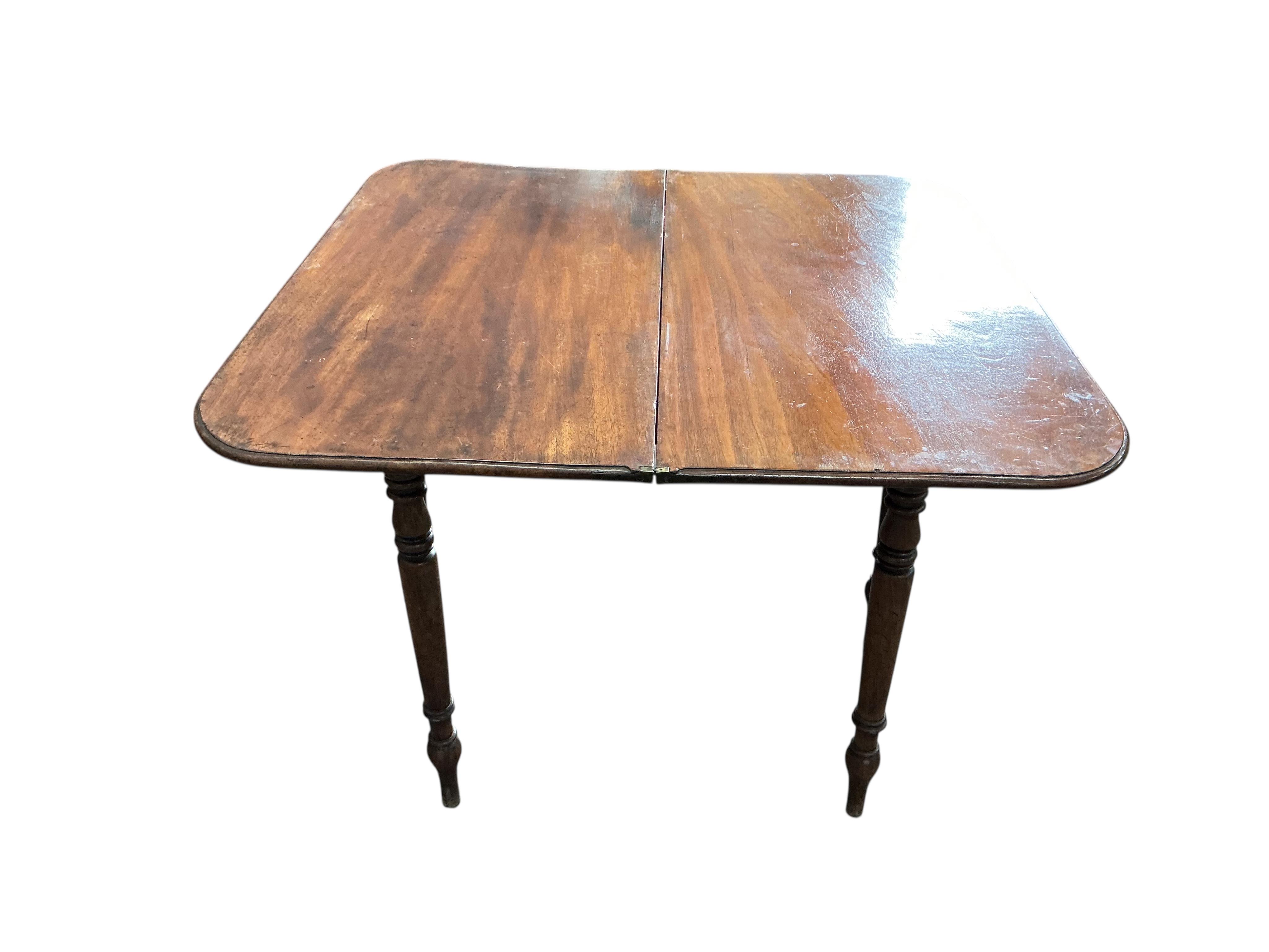 A Regency mahogany 'D' shaped folding tea table, width 91cm, depth 45cm, height 76cm